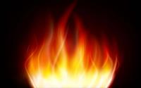 Burning red, orange, and yellow flame centered in the image, set against a black background.