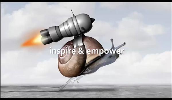Snail with a Rocket Launcher on its back - White Letters Spell Out: inspire & empower